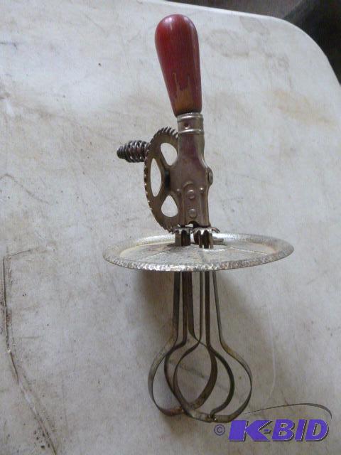 lot 90 image: Vintage Red Handle Egg Mixer...