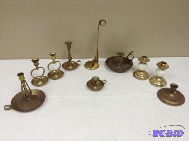 lot 143 image: Collection of Brass Candle Holders