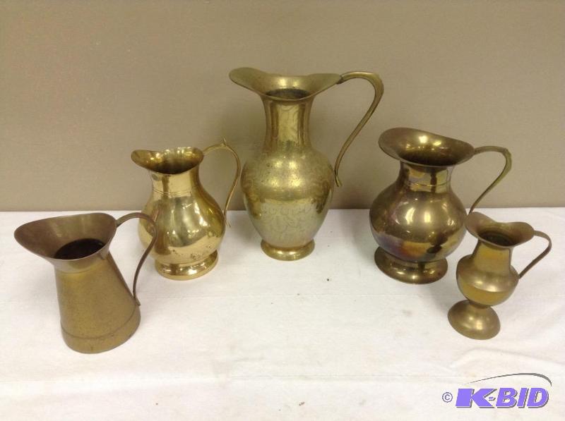 lot 20 image: Grouping of Brass Pitchers