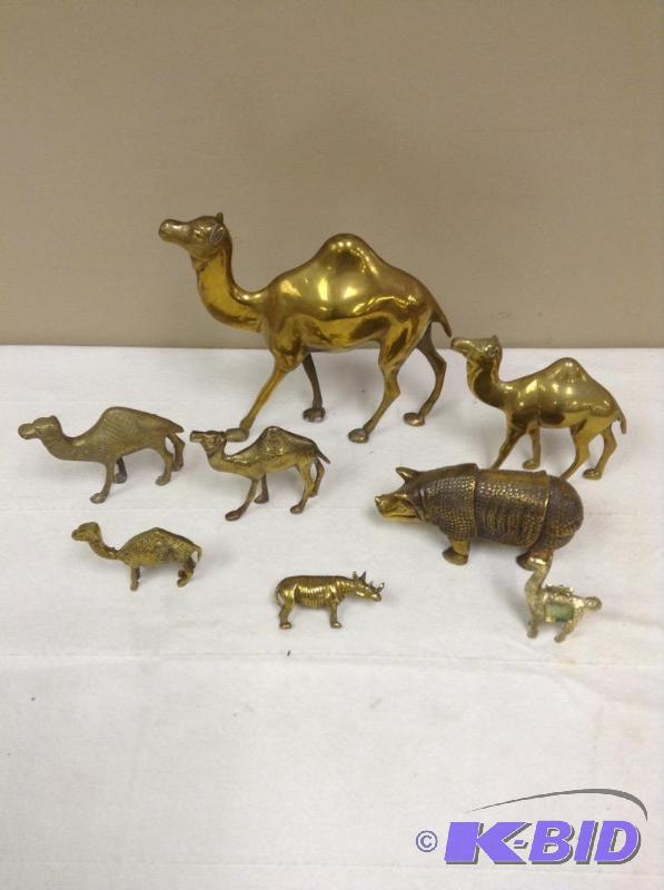 lot 22 image: Collection of Brass Camels & Rinos