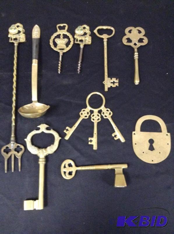 lot 59 image: Decorative Brass Keys and Utensils