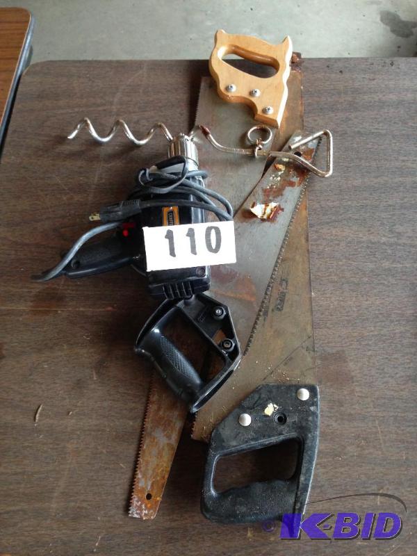 Lot of misc. hand saws and corded drill....
