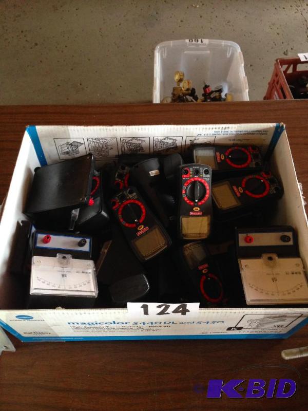 Bow lot of multimeters. Some digital, some an...
