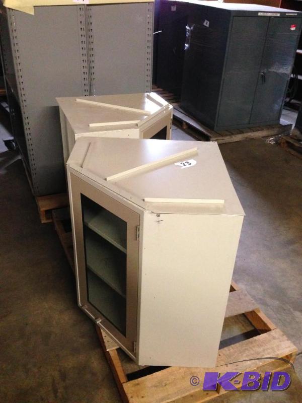 2 corner storage cabinets....
