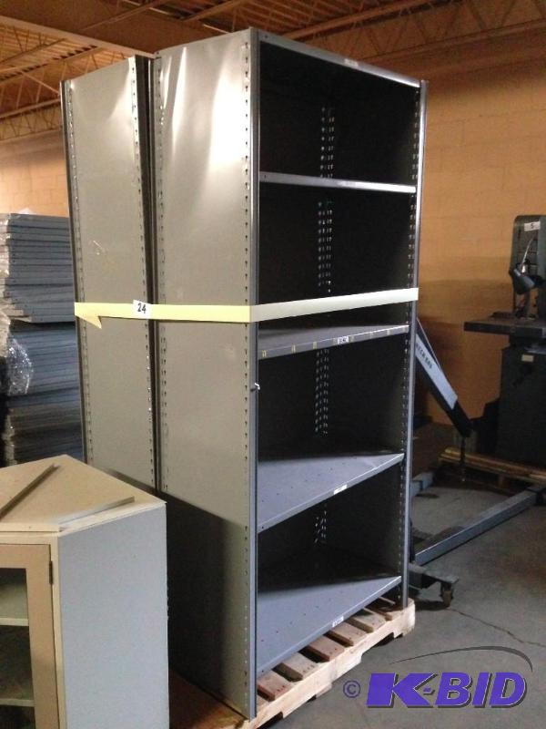 2 upright metal shelving racks....