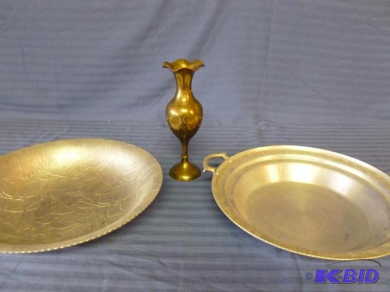 lot 104 image: This lot consists of a cast brass vase and tw...