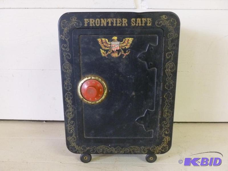 lot 119 image: Vintage Frontier Safe metal coin bank that me...