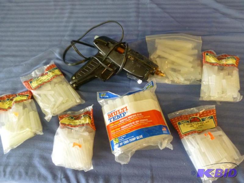 lot 143 image: Sears hot melt glue gun and several bags of g...