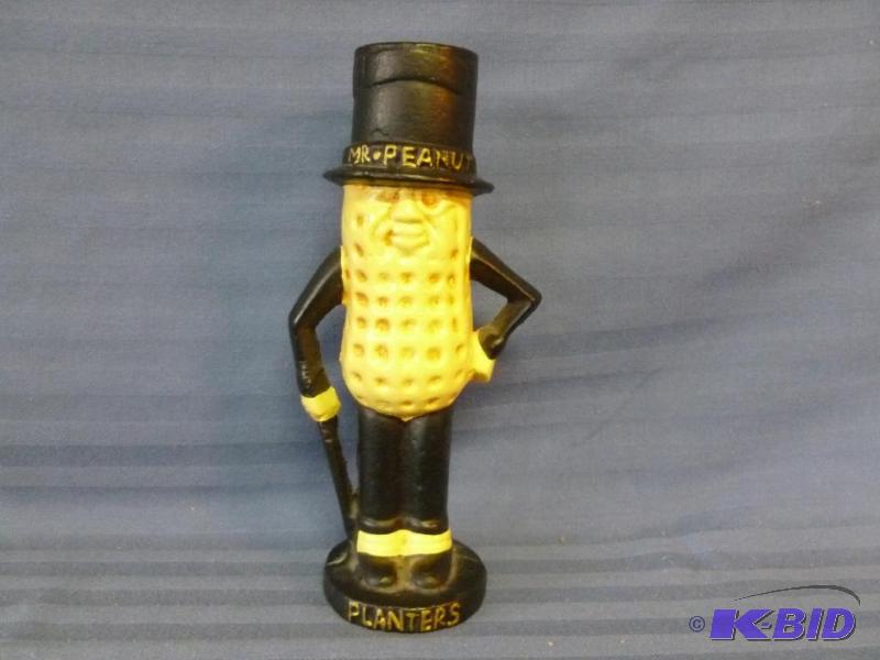 lot 17 image: Collectible Planters Mr. Peanut cast iron man...