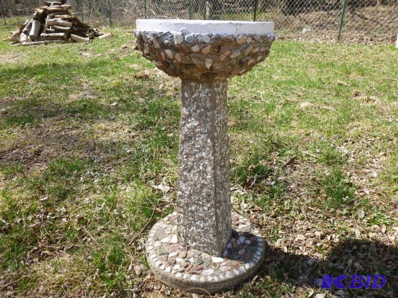 lot 2 image: Large stone and cement bird bath that measure...