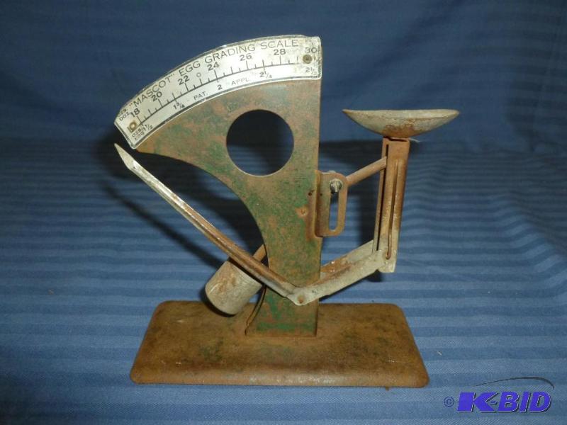 lot 26 image: Vintage Mascot Egg Grading Scale. ...