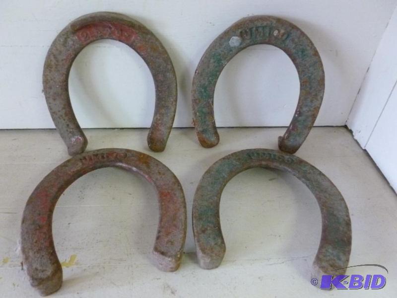 lot 49 image: A set of four vintage Umico throwing horsesho...
