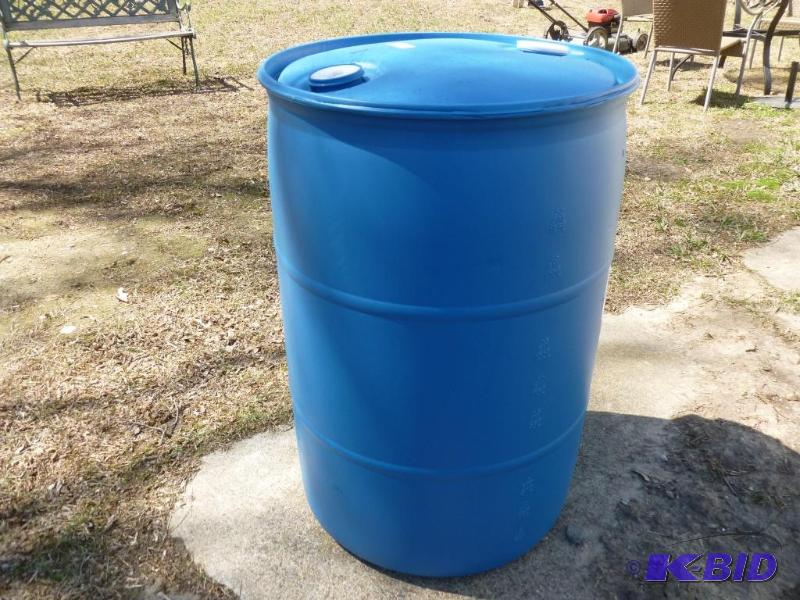 lot 53 image: Large 55 gallon plastic barrel, comes with tw...