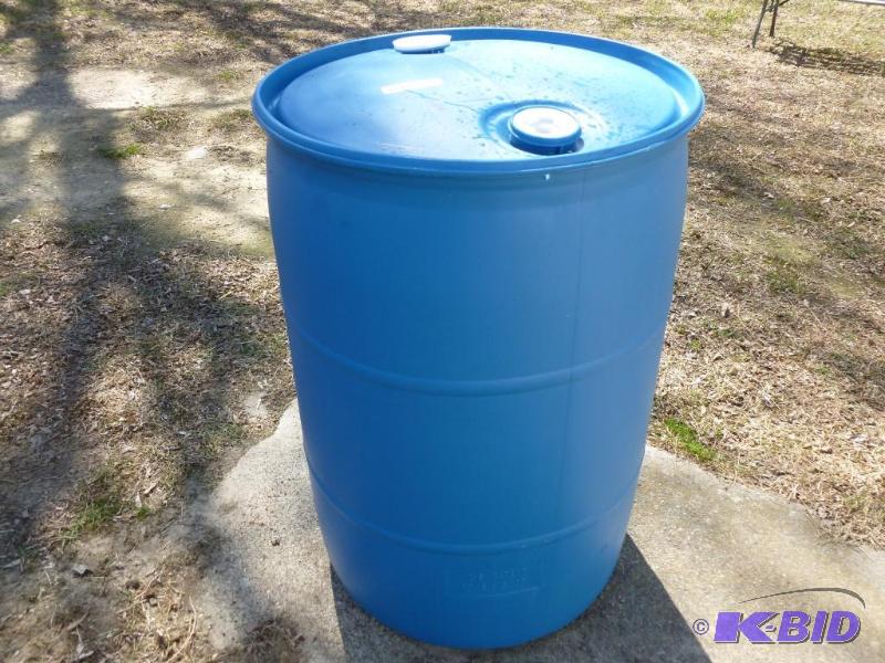 lot 55 image: Large 55 gallon plastic barrel, comes with tw...