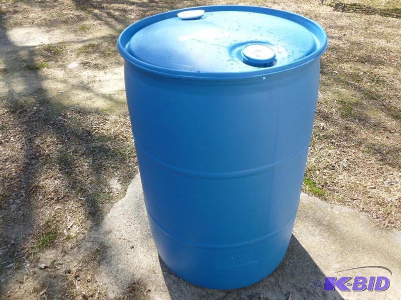 lot 56 image: Large 55 gallon plastic barrel, comes with tw...