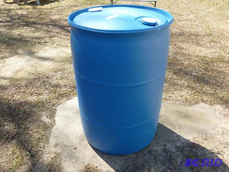 lot 63 image: Large 55 gallon plastic barrel, comes with tw...