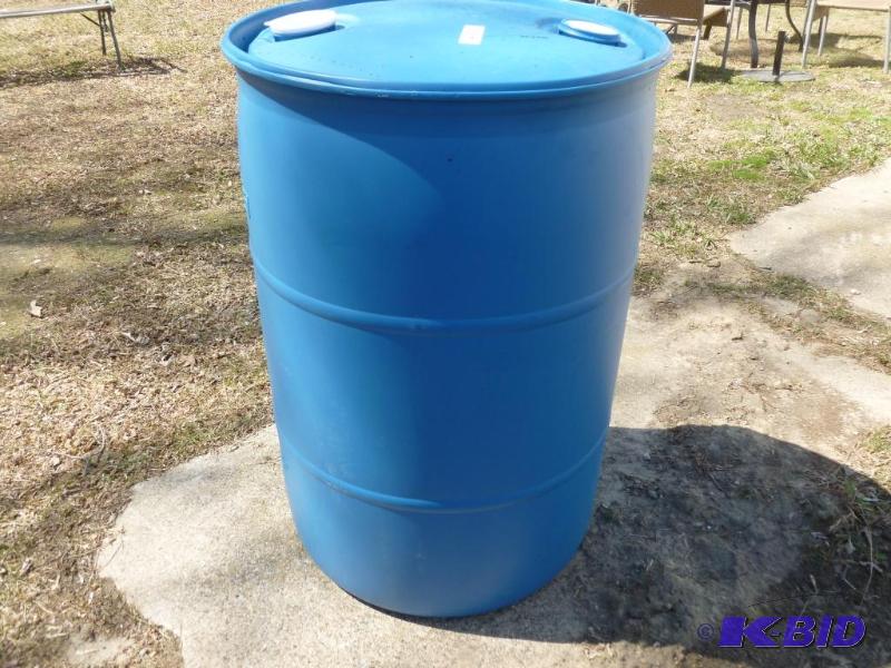 lot 65 image: Large 55 gallon plastic barrel, comes with tw...