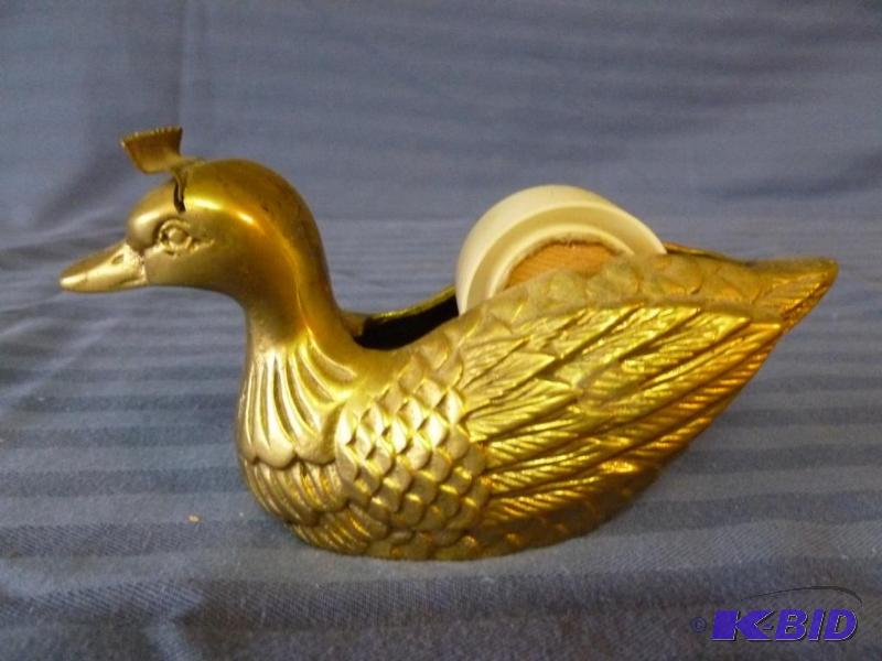 lot 88 image: Vintage cast brass duck tape dispenser, measu...