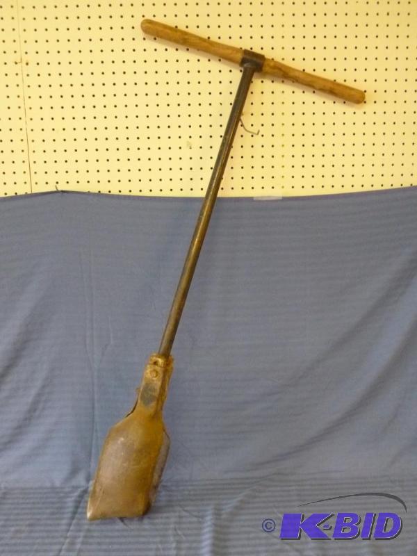 lot 91 image: Vintage wood handled post hole digger, measur...