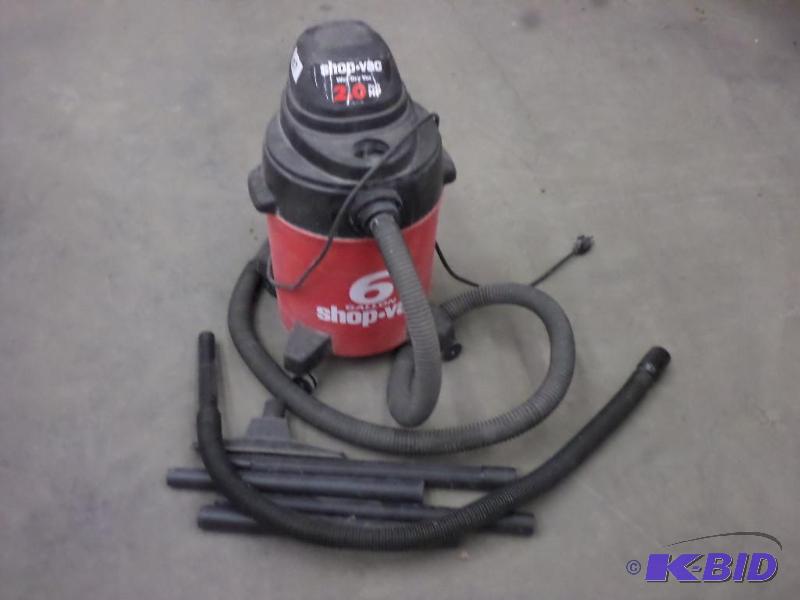 lot 107 image: Shop-Vac 6-Gallon 2HP WetDry Vac With Spare ...