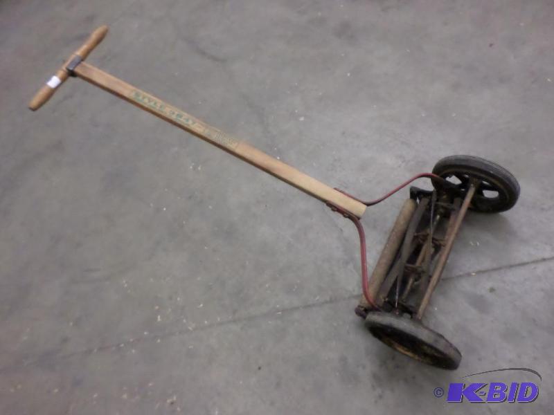lot 30 image: Antique Reel Mower...