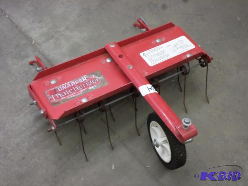 lot 34 image: Snapper 21" Front-Mount Thatcher Unit...