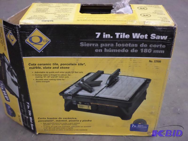 lot 50 image: New Qep 7" Tile Wet Saw...