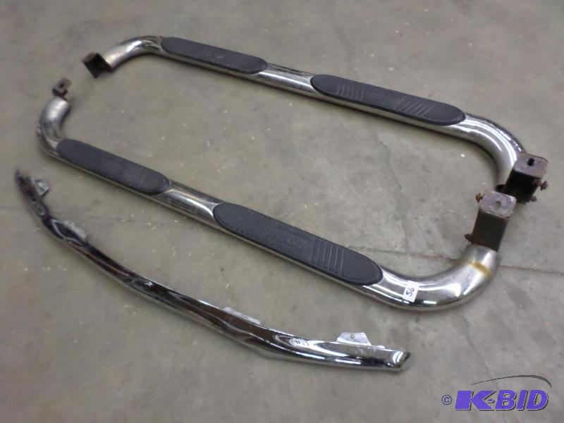 lot 56 image: Set Of Chevy Nerf Bars & Bug Shield...