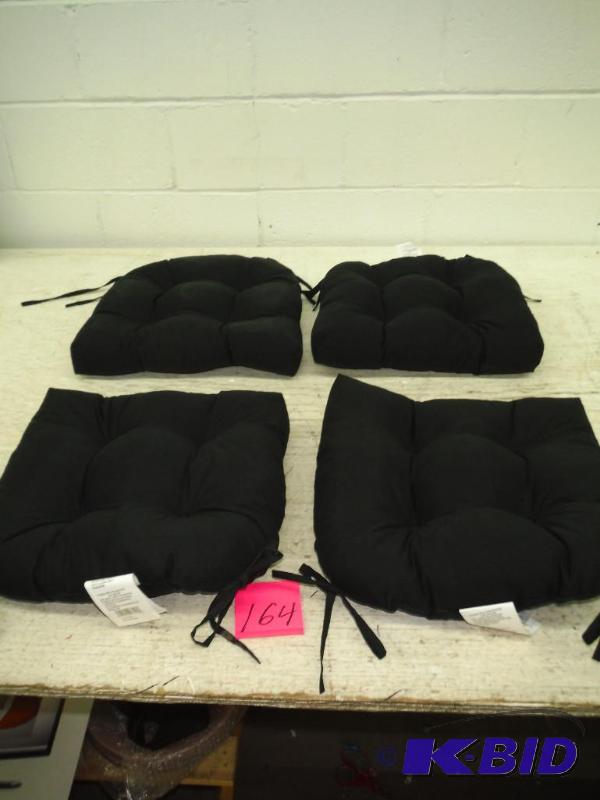 lot of 4 outdoor seat cushions