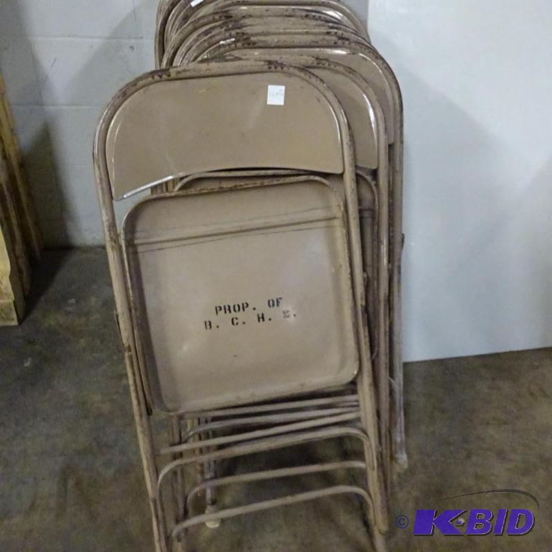 8 Folding Chairs...