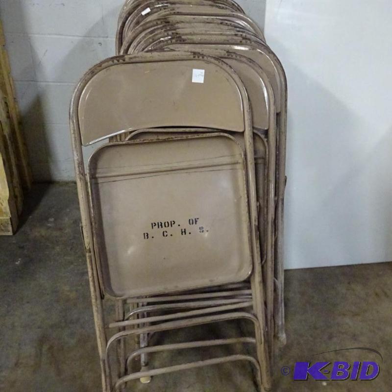 9 Folding Chairs...