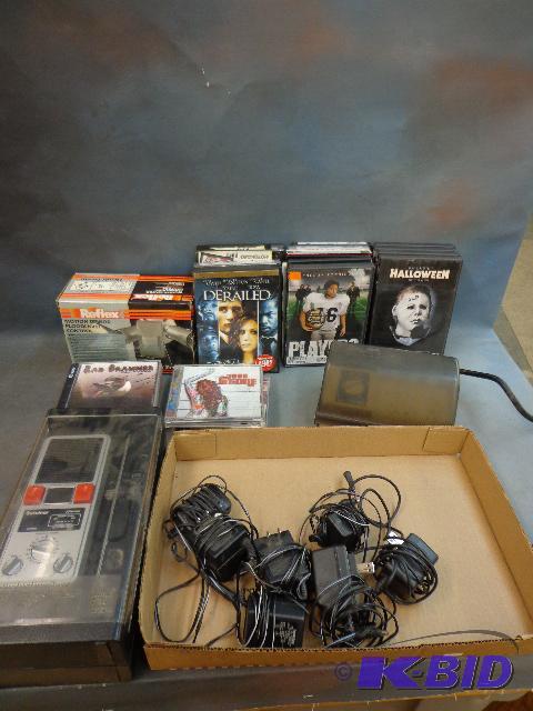 lot 105 image: Assorted DVDs, CDs, Power Strip,&nbspMotio...