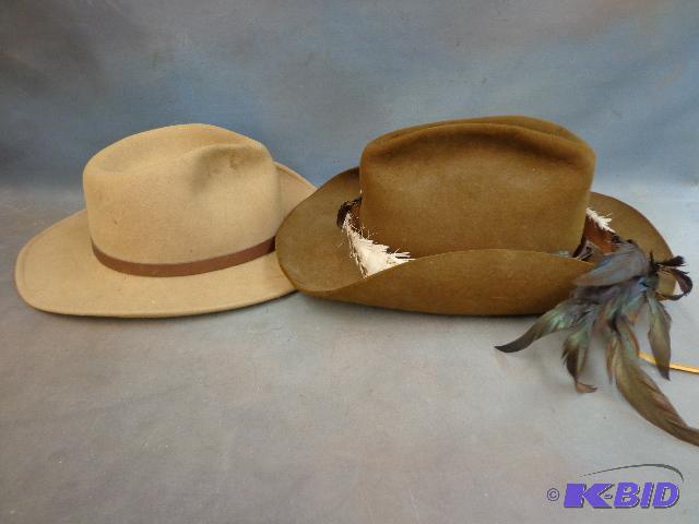 lot 155 image: (2) Wool Felt Cowboy Hats   1 has feathers&nb...
