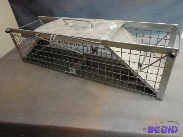 lot 25 image: Havaheart Live Trap   2 trap doors  25 x 7 x ...