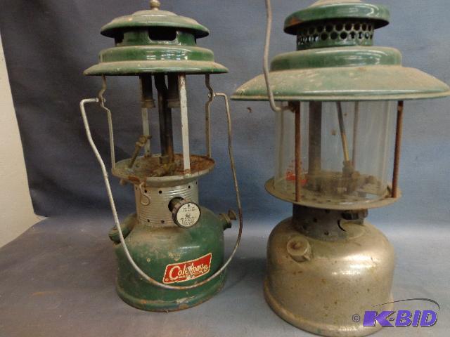 lot 31 image: (2) Coleman Lanterns   14" tall ...