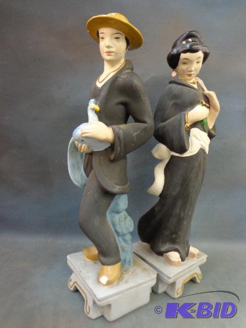 lot 49 image: Man and Woman Oriental Statues   20" tal...