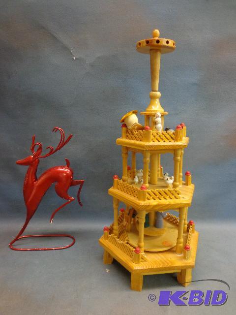 lot 74 image: 16" Tall Wooden Carousel and Red Iron Re...