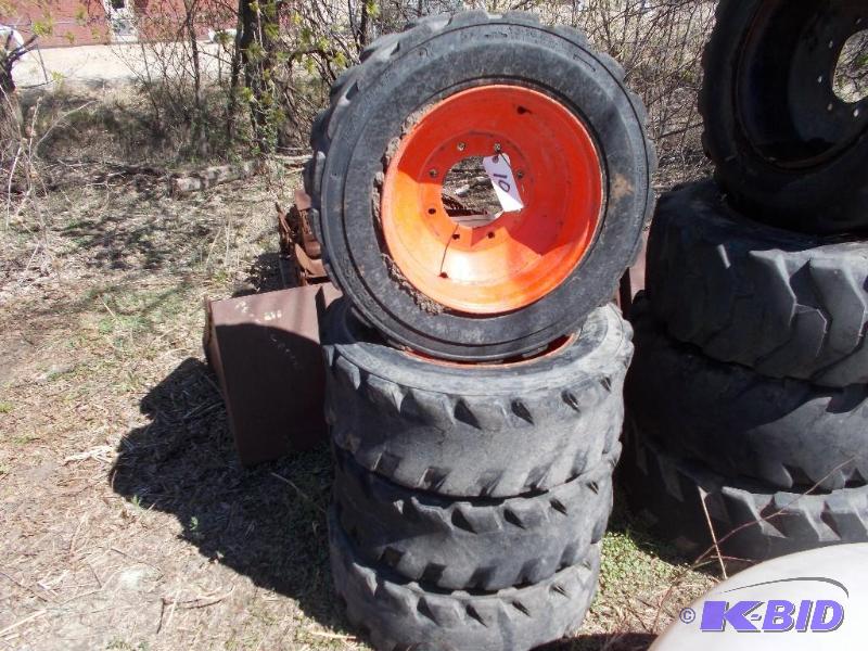lot 10 image: (4) Skid Loader Rims & Tires, 10-16.5...