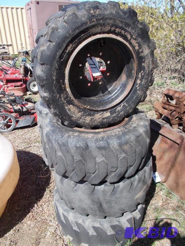 lot 11 image: (4) Skid Loader Rims & Tires, Were Used w...