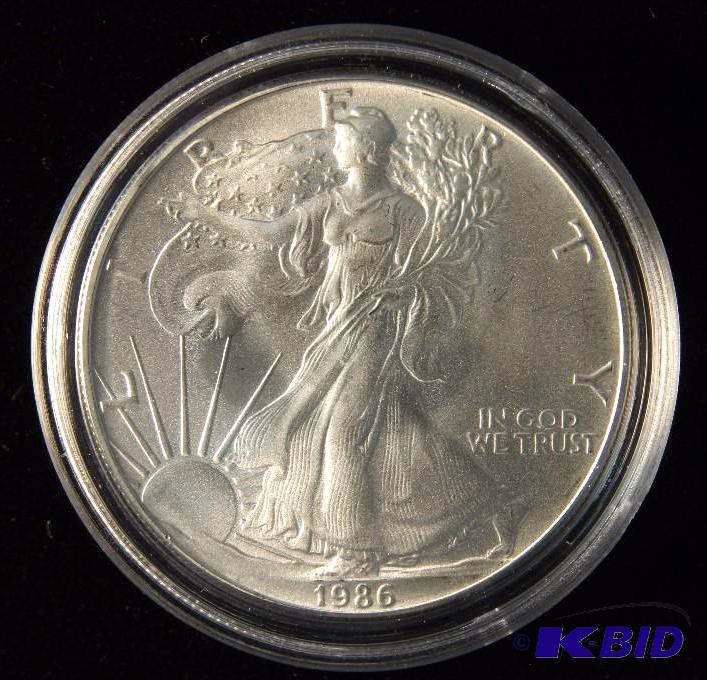 1986 US SILVER EAGLE IN AIRTIGHT HOLDER 1 TROY Oz. .999 SILVER DOLLAR