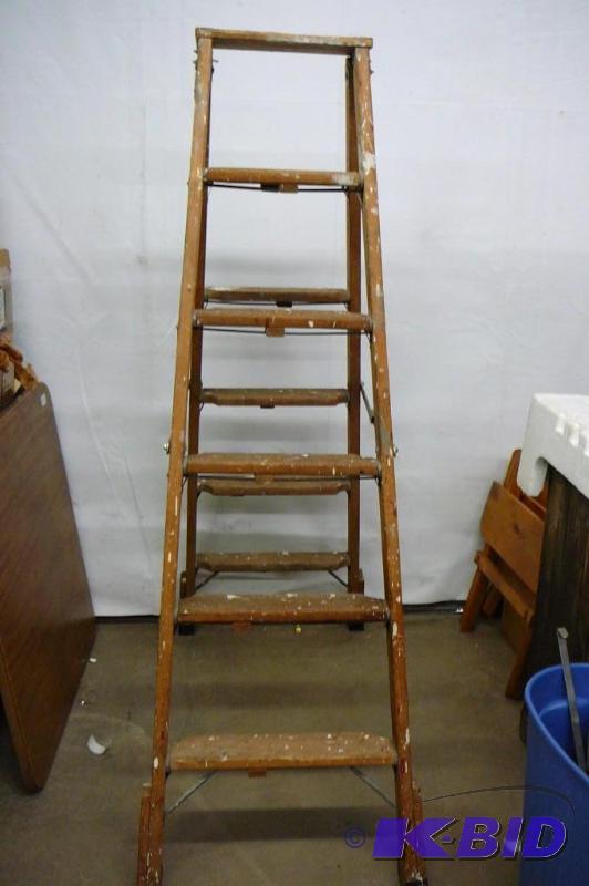 lot 110 image: 69" Tall wooden ladder two sides...