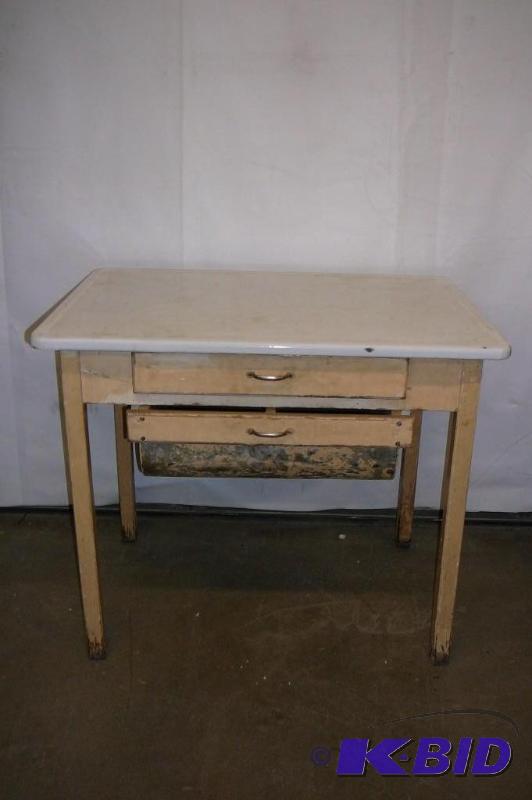 lot 122 image: Table with Porslien top 2 drawer 25&quotd X ...