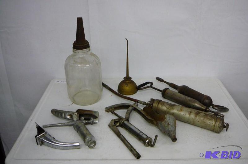 lot 143 image: Grease Guns Funels Filter Wrench Misc...