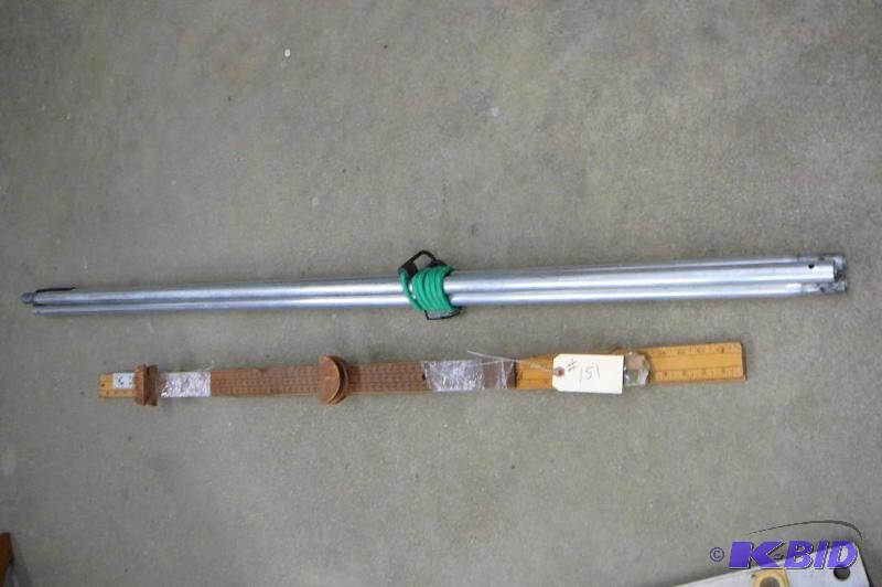 lot 151 image: Lot of Yard Sticks and Alum Poles...