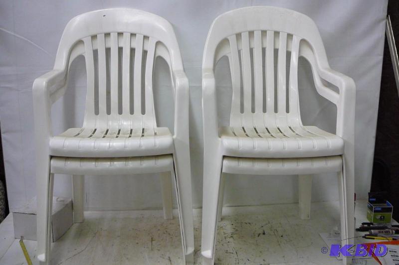lot 20 image: 4 White Plastic Lawn Chairs...
