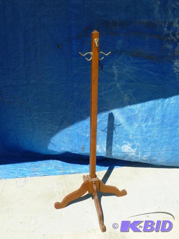 lot 13 image: Nice wooden coat rack that measures 49" ...