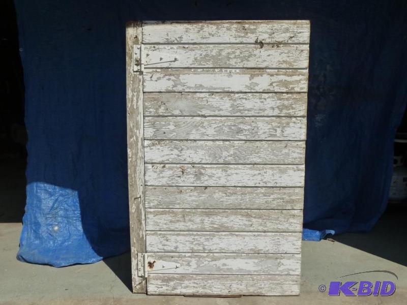 lot 36 image: Vintage wooden barn door, measures about 38.5...