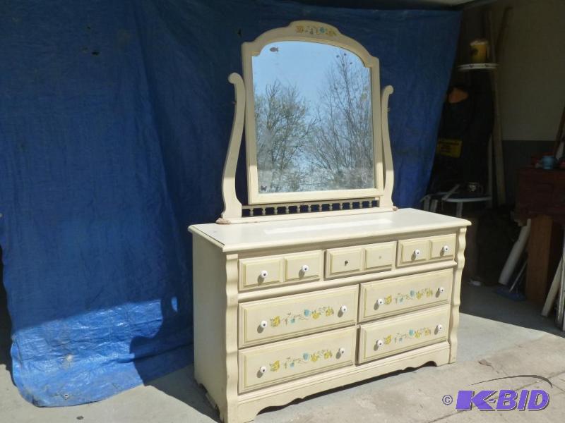 lot 42 image: Kids seven drawer wooden dresser with back mi...
