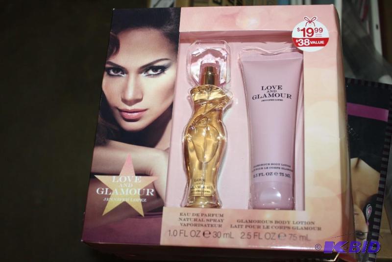 lot 118 image: Bag Lot Including Glamour Perfume Kim Kardashian Perfume Set.