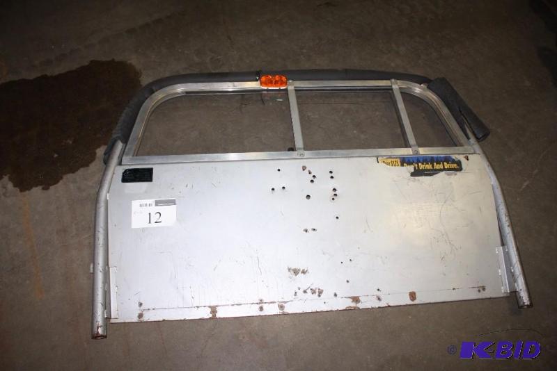 lot 12 image: The Body Guard By Setina MFG. Co. Cab Divider wReinforced Barrier & Window 54 x 36.